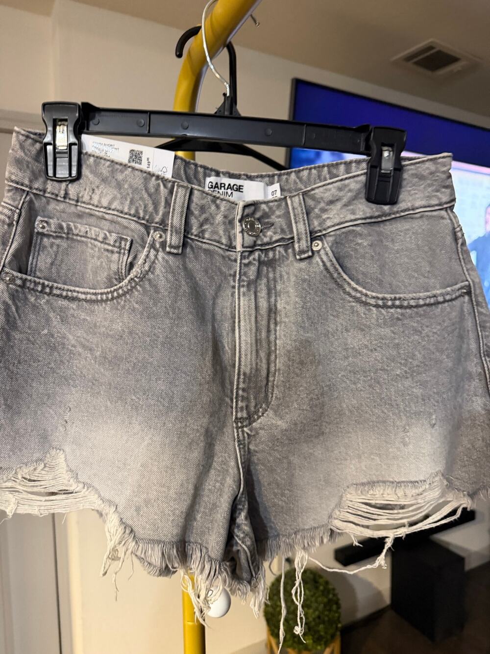 Garage Denim shorts feature a high-rise waist
